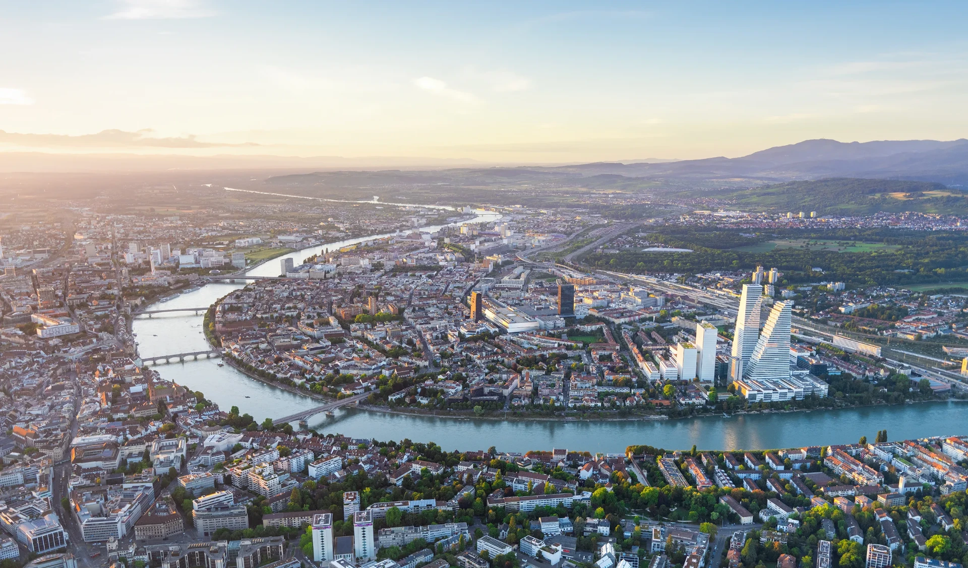 Daylight over Basel and the curve of the Rhine.
